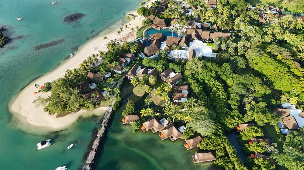 constance-prince-maurice-overwater-villa-photo--showcasing-private-terrace-views--calm-turquoise-lagoon-water-and-five-star-island-luxury..webp