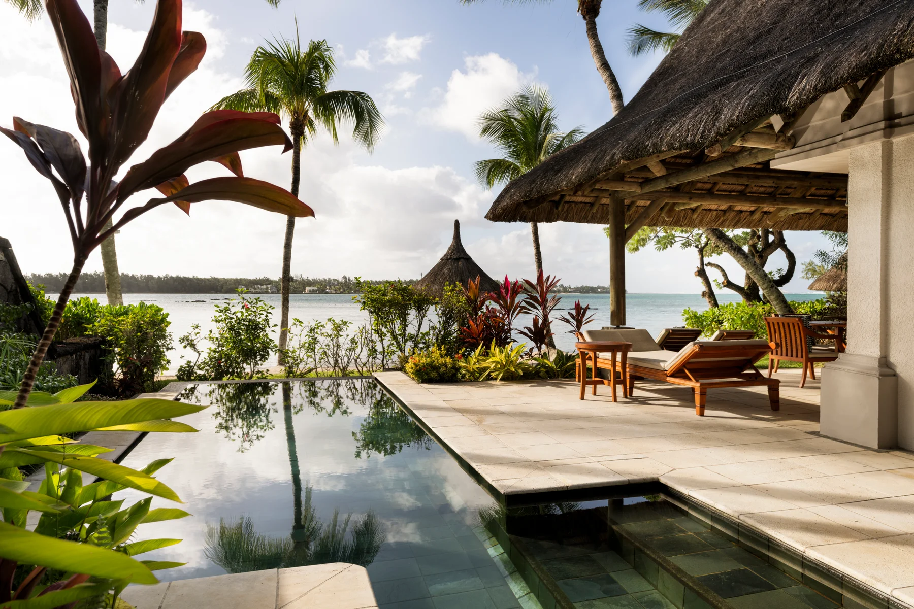 luxury-beach-villa-at-constance-le-prince-maurice--offering-direct-access-to-the-beach-and-a-calm-east-coast-mauritius-setting..webp