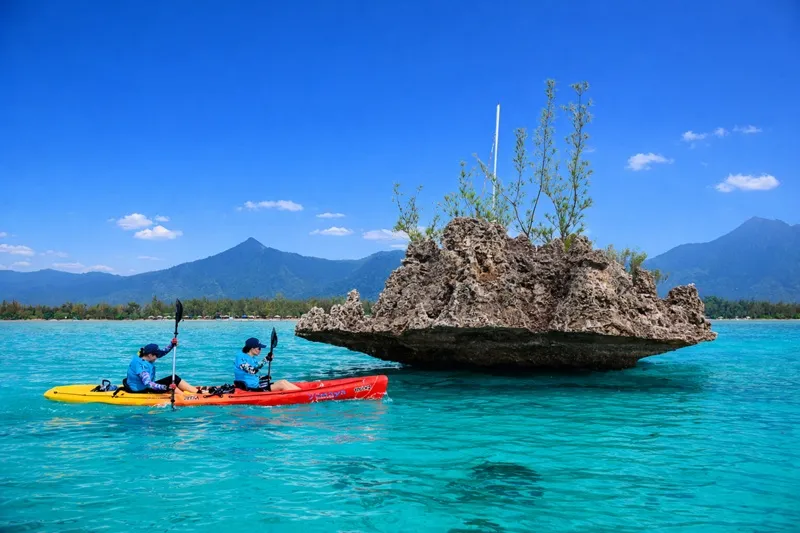 women-kayaking-in-the-turquoise-lagoon-during-femina-adventure-mauritius--a-women-only-adventure-raid-combining-sport--nature-and-teamwork.webp