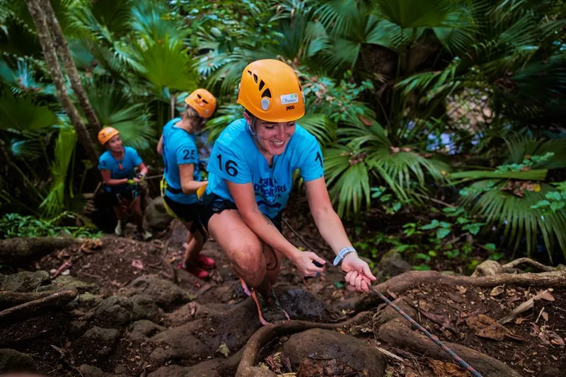 women-standing-at-the-finish-line-of-femina-adventure-mauritius-after-a-powerful-island-adventure-filled-with-courage-and-teamwork..webp
