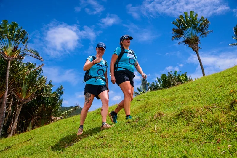 women-trail-running-through-lush-forest-landscapes-in-mauritius-during-femina-adventure--a-unique-women-s-sports-event..webp