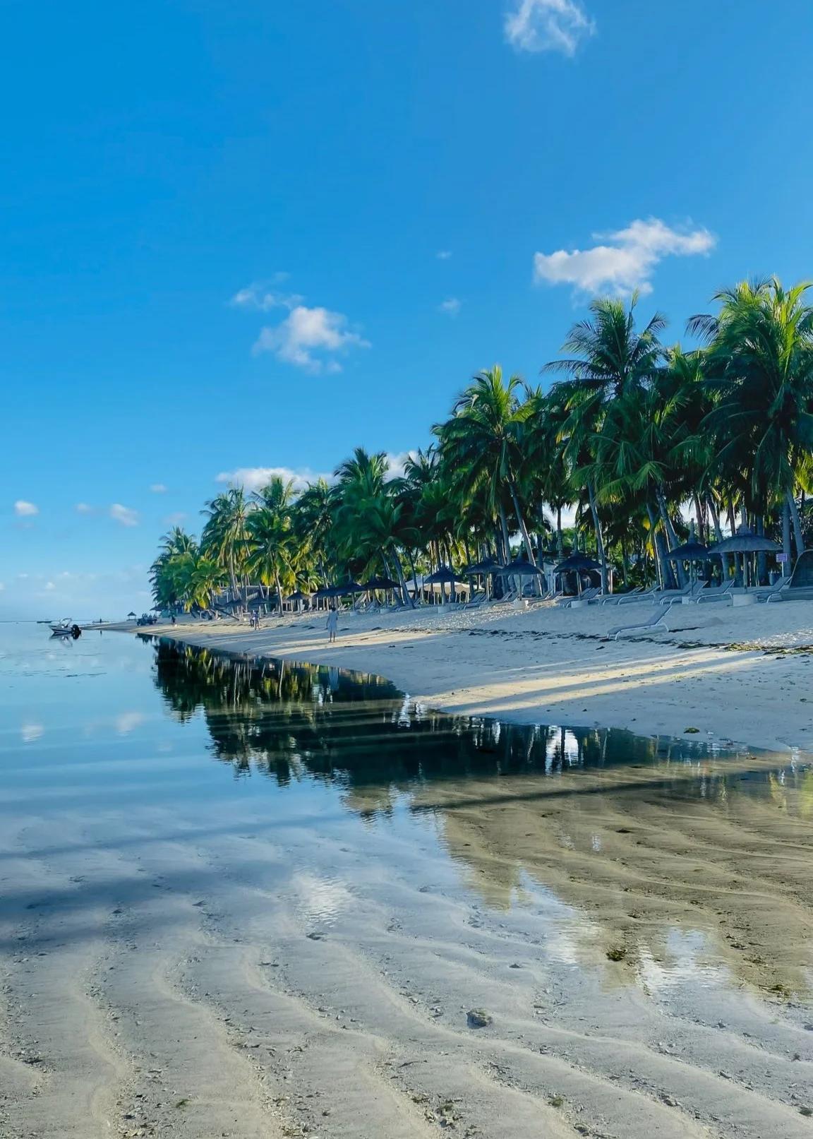 Wolmar Beach Mauritius travel photo, showcasing soft sand, clear lagoon water and the natural beauty of the island’s west coast.