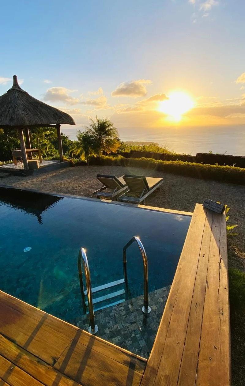 chamarel-eco-resort-with-piton-canot-backdrop.webp