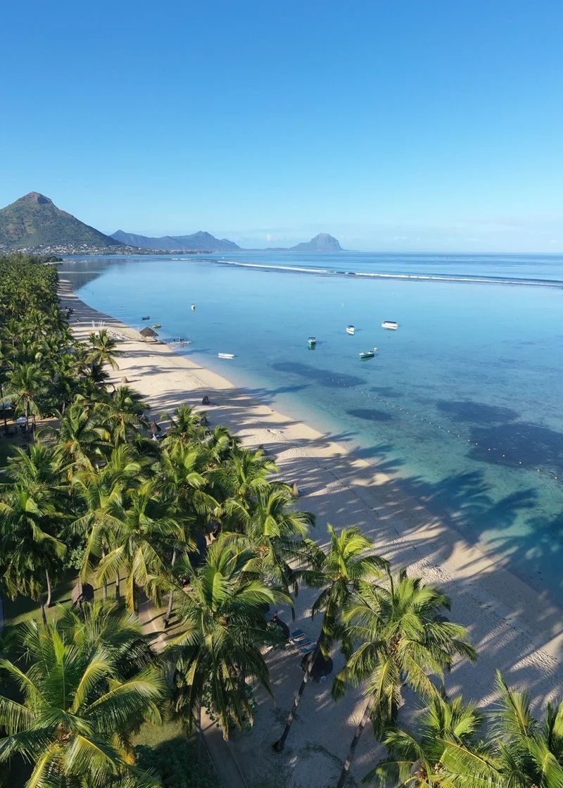 West coast beach view at Flic en Flac Mauritius, a must-visit destination for swimming, snorkelling, sunsets and relaxed island holidays.