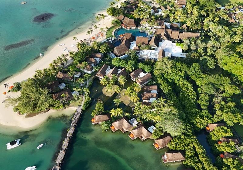 constance-prince-maurice-overwater-villa-photo--showcasing-private-terrace-views--calm-turquoise-lagoon-water-and-five-star-island-luxury..webp