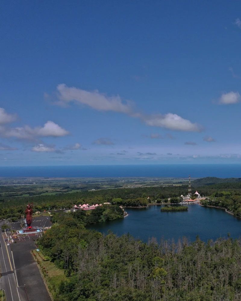 Ganga Talao in Mauritius with colourful Hindu shrines around the sacred lake