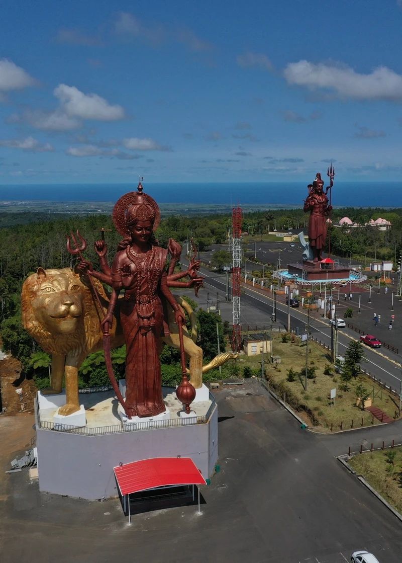 Grand Bassin temple complex in Mauritius surrounded by misty highland forest