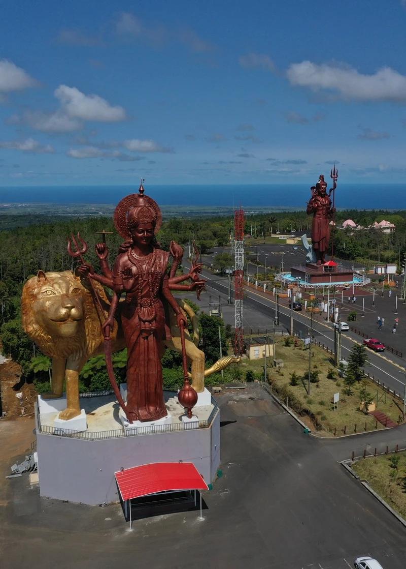Grand Bassin temple complex in Mauritius surrounded by misty highland forest