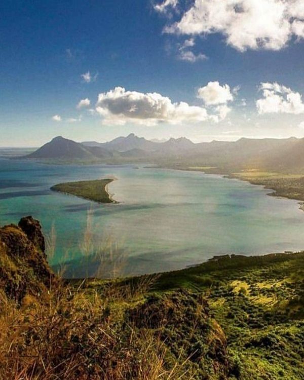 Hike to Le Morne Brabant viewpoint, featuring dramatic cliffs, coastal scenery and one of the best views in Mauritius.