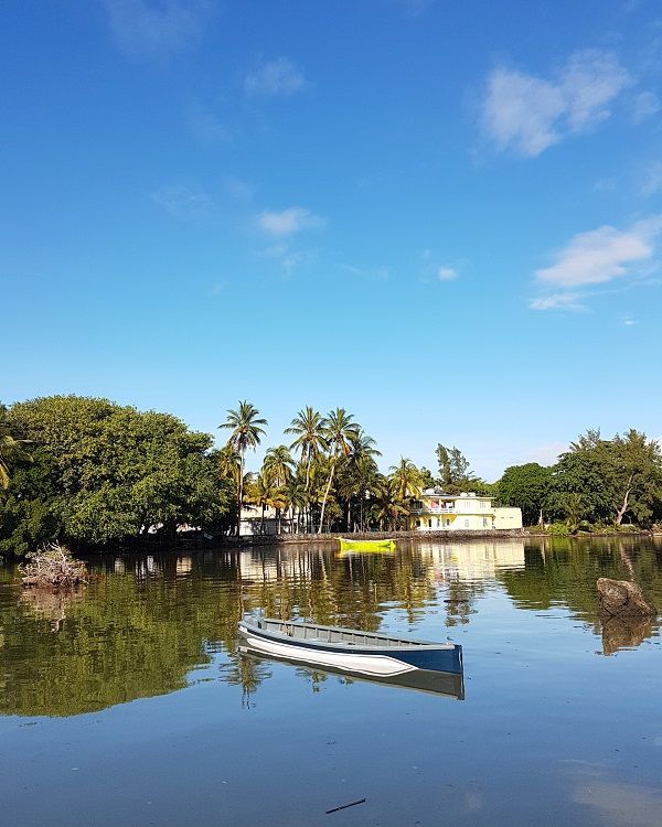 Mahébourg waterfront Mauritius, a peaceful seaside area with mountain views, local life and south-east coastal charm.