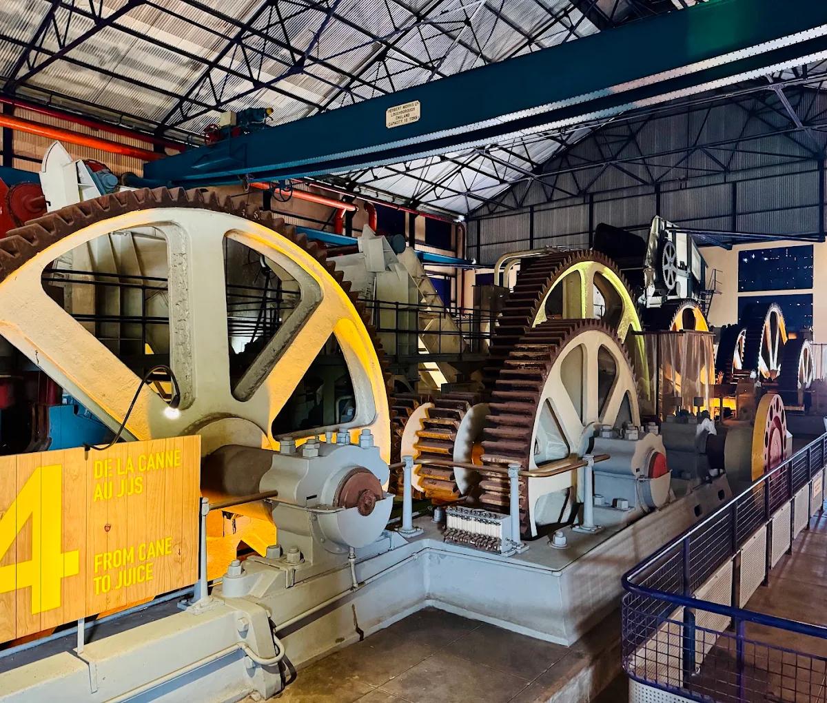 Historic sugar mill machinery at L’Aventure du Sucre museum in Pamplemousses, Mauritius.