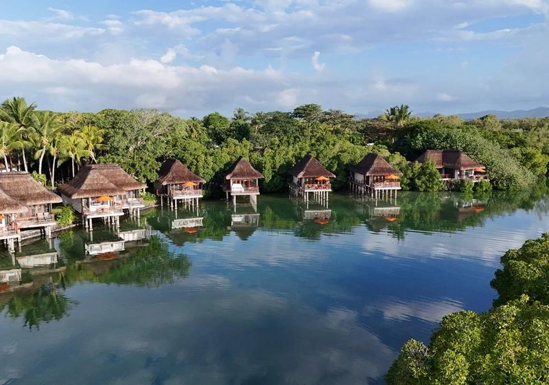 overwater-villa-at-constance-prince-maurice-mauritius--a-romantic-luxury-escape-surrounded-by-calm-lagoon-water-and-tropical-island-scenery..webp
