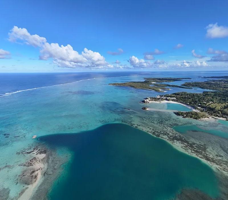 panoramic-view-of-trou-d-eau-douce-from-a-shangri-la-le-touessrok-luxury-villa.webp