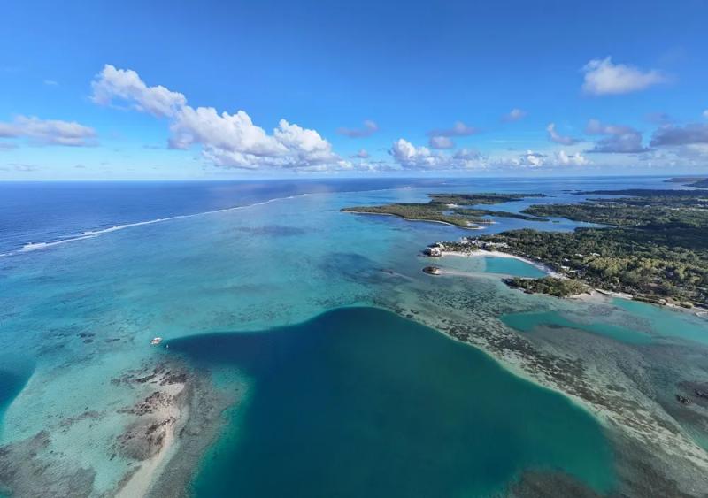 panoramic-view-of-trou-d-eau-douce-from-a-shangri-la-le-touessrok-luxury-villa.webp