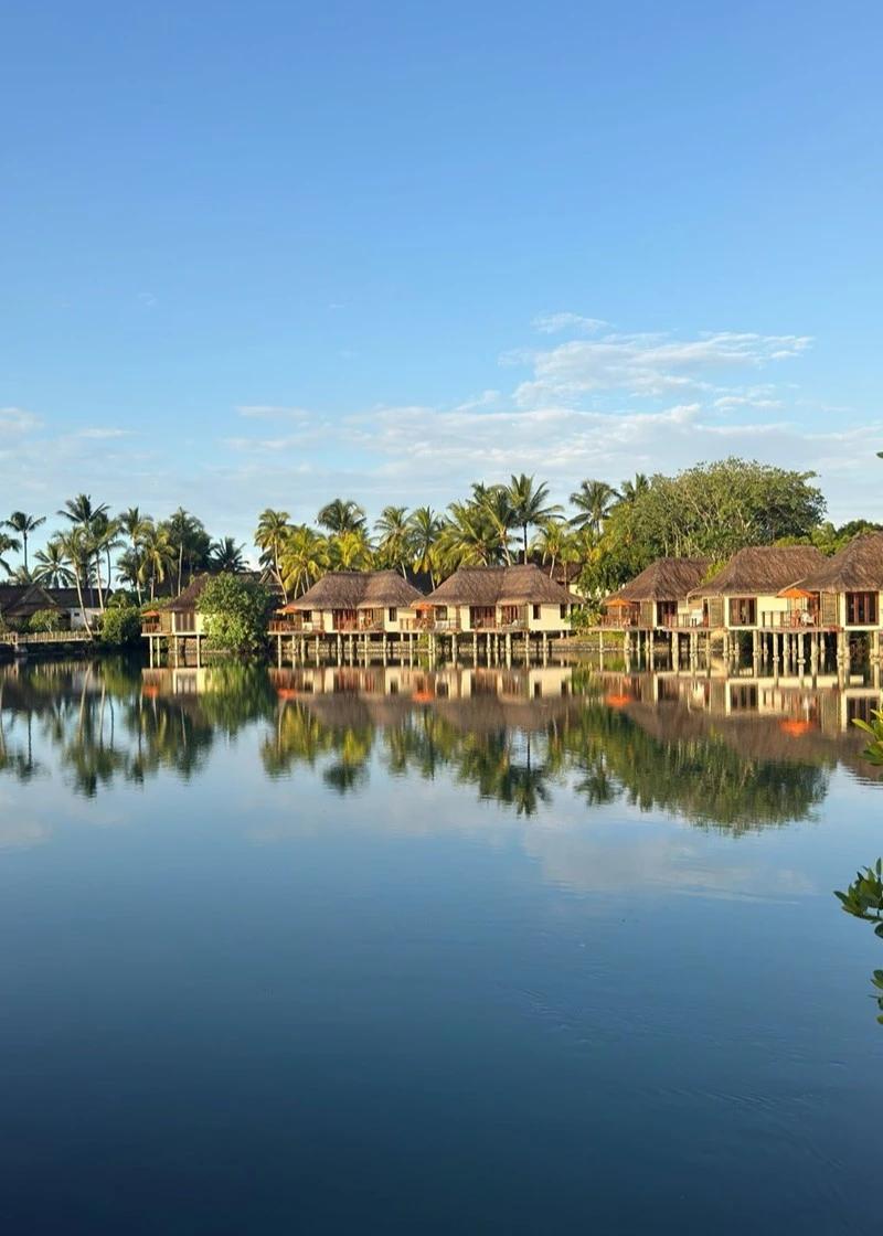 private-deck-at-constance-prince-maurice-overwater-villa--overlooking-the-turquoise-lagoon-and-tropical-coastline-of-mauritius..webp