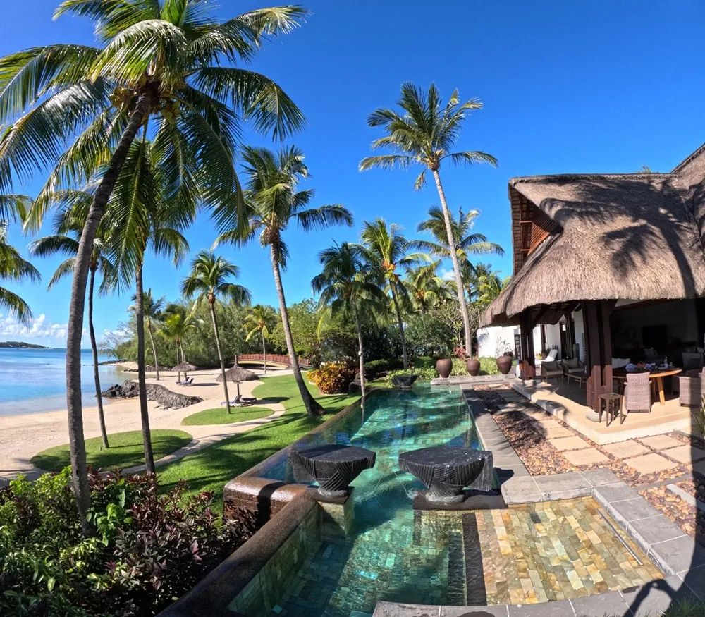 private-terrace-overlooking-the-coconut-garden-of-a-luxury-villa-at-shangri-la-le-touessrok..webp